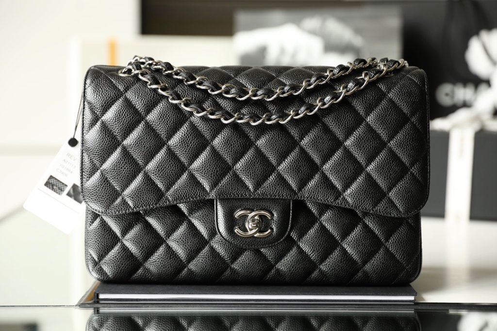 Chanel Classic Flap Medium Black Caviar Leather with silver buckle