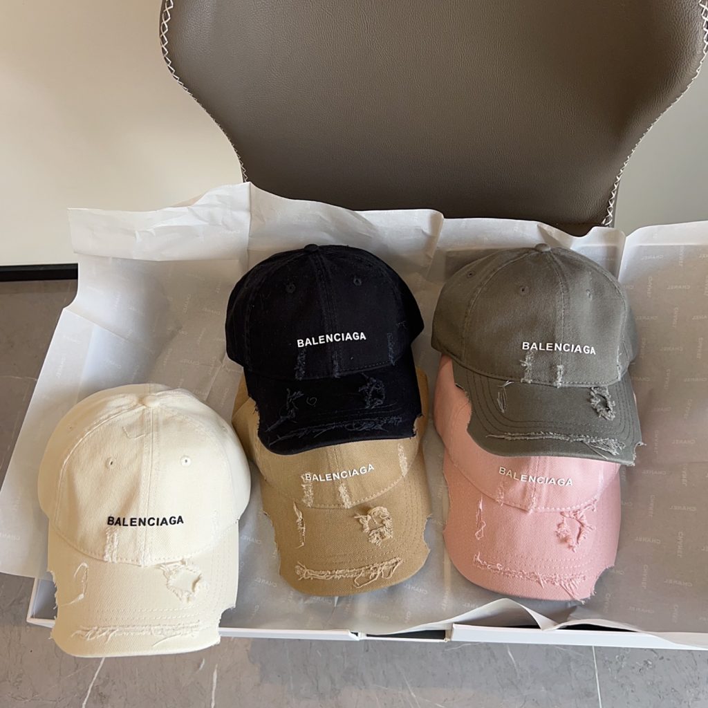 The New Balenciaga Asymmetrical Distressed Baseball Cap